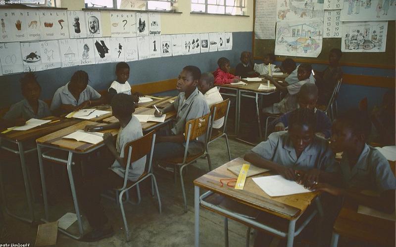 Zambian schoolgirls smiling in a classroom